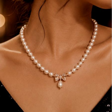 Handcrafted Peach Pearl Bow Pendant Necklace